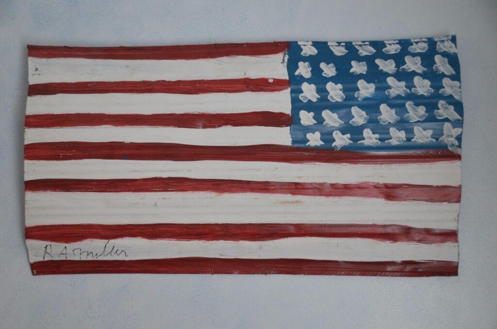photo of flag painted on tin